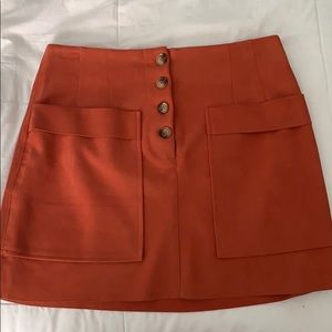 Burnt orange suede button up skirt